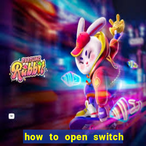 how to open switch oled game card slot